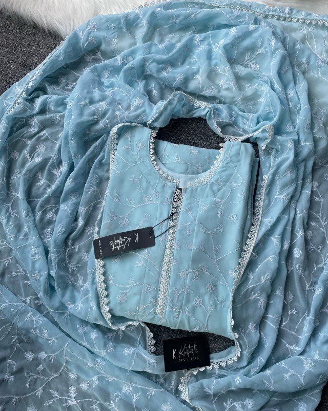 Kurtiistic EID COLLECTION  - 01 | A soft pastel blue base is enhanced with delicate all-over white embroidery work & lace Work |