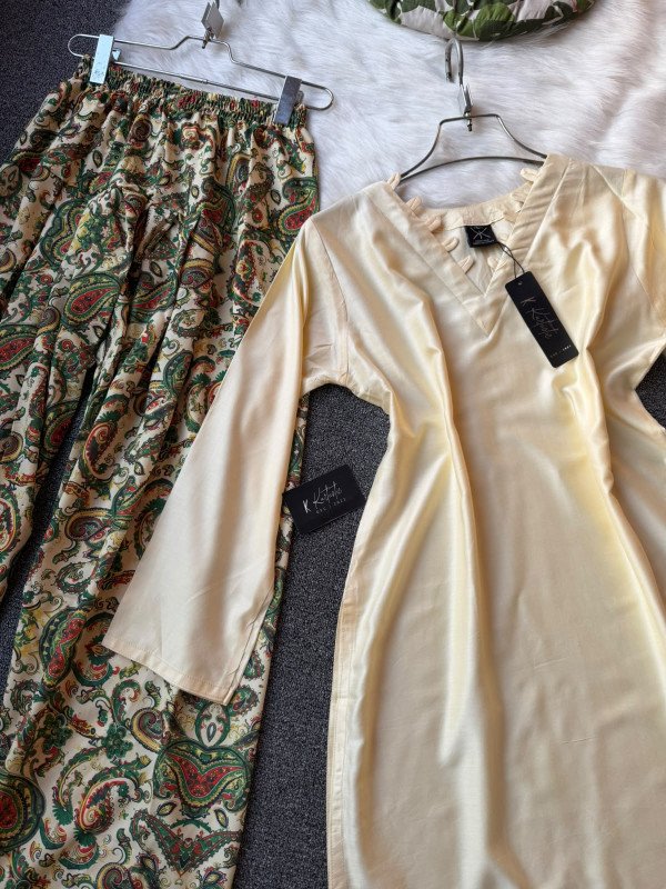 light butter yellow “SHEHNAI” Premium V-Neck Decorative Fabric Loop Detailing with printed FARSHI SHALWAR.